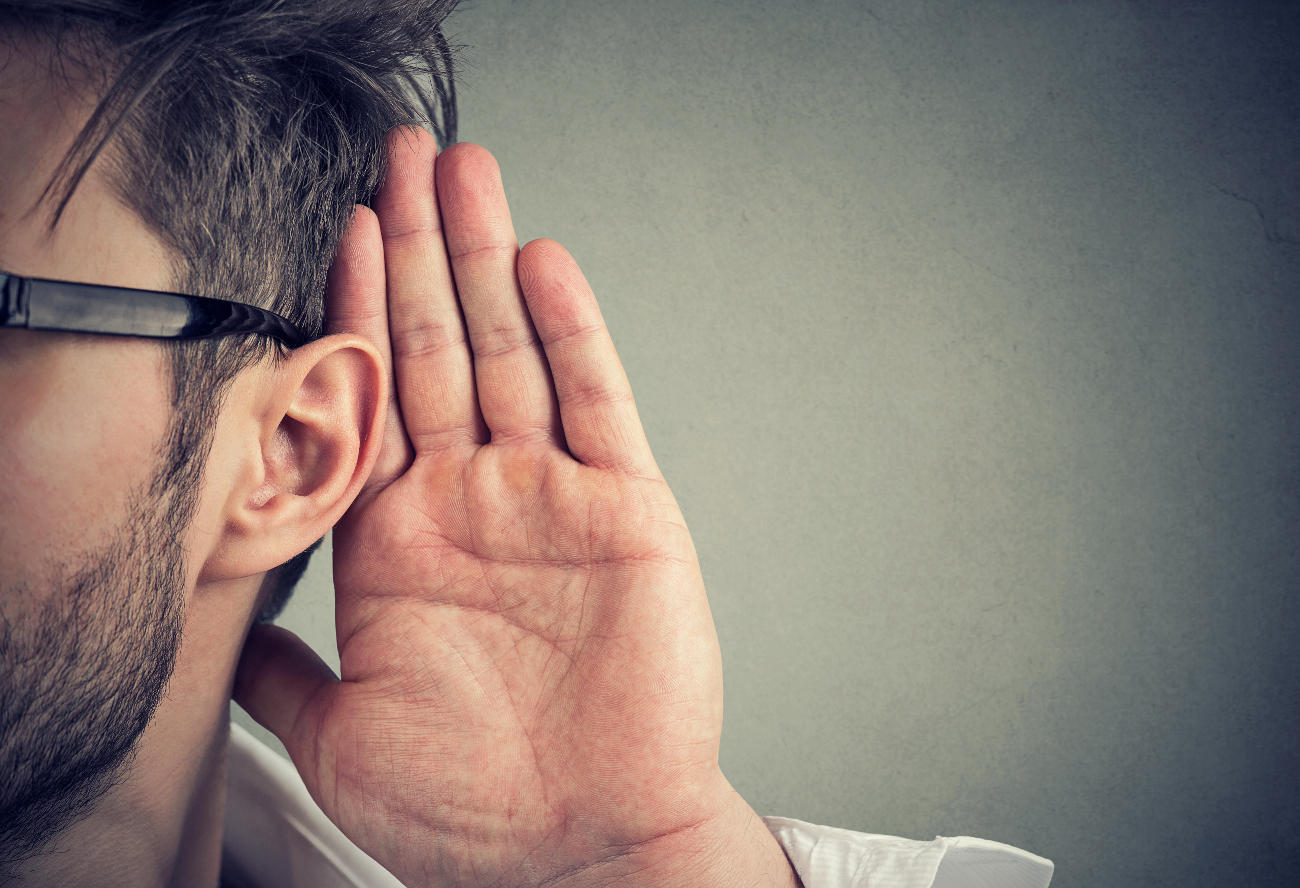 Our community is listing to your requests. Stylish close-up of a man holding his hand up to his ear.